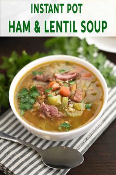 a white bowl filled with ham and lentil soup on top of a striped napkin