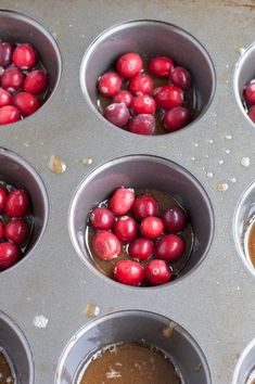 cupcake tins filled with chocolate and cranberries