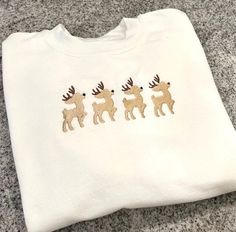 This sweatshirt is even better in person! So CUTE! Perfect to wear during the Christmas season and even after.  This listing is for YOUTH sizes.  Merry will be embroidered on front center of sweatshirt I use Gildan Brand Crew Neck (Youth Sizes S - XL).  S = 6-8, M = 10-12, L = 14-16, XL = 18-20 NOTE: These are YOUTH sizes! Please let me know what color threads you want me to use. This is a custom made sweatshirt and there are no returns excepted unless it is due to an error that I made. Winter Sweatshirt Ideas, Embroidery Crewneck Ideas, Cricut Gift Ideas For Women, Outfit Ideas Shirt, Sweatshirts Aesthetic, Shirt Outfit Ideas, Embroidery Shirts, Shirt Design Ideas, Embroidery Crewneck