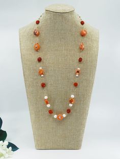 This set is a design sample from The Nine collection which features salmon coral beads in its one-of-a-kind design. ❀ Natural Salmon Coral (10-12mm), Red Coral Coin (10mm), and Seashell Beads (8mm)❀ 14K Gold Filled Clasps and Chain❀ Length: 28 in. Elegant Red Coral Jewelry With 8mm Beads, Elegant Orange Necklaces With Polished Beads, Elegant Orange Gemstone Beads Necklace, Elegant Orange Beaded Necklaces With Gemstone Beads, Elegant Orange Gemstone Beaded Necklaces, Orange Red Coral Beads For Jewelry Making, Orange Gemstone Round Beads Jewelry, Elegant Coral Round Bead Necklaces, Elegant Red Rondelle Beads