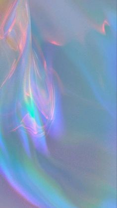 an abstract image of blue, green and pink colors