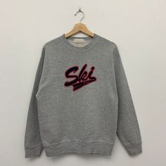 ">> Vintage Ski Jackson Hole Sweatshirt ** Size : Medium ** Measurement on laid flat : >> Armpit : 20.5\" >> Shoulder to bottom : 26\" >> Length sleeve from collar : 28\" ** Great used condition. ** Slightly stains/marks at front and sleeve. ** Overall condition is 7/10. ** Weight : 400g #SW-1" Winter Sporty Sweatshirt With Embroidered Text, Sporty Winter Sweatshirt With Embroidered Text, Sporty Sweatshirt With Embroidered Text For Winter, Winter Crew Neck Top With Embroidered Logo, Winter Sweater With Embroidered Logo And Relaxed Fit, Casual Crew Neck Sweater For Ski Season, Crew Neck Tops With Embroidered Logo For Winter, Sporty Winter Tops With Embroidered Text, Sporty Winter Top With Embroidered Text