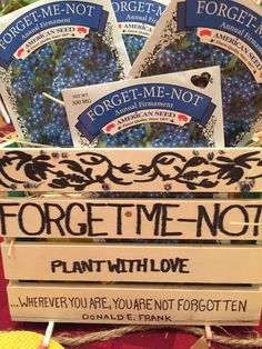 there is a sign that says forget time not with love in front of blueberries