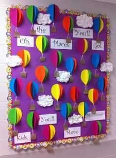 a bulletin board with hot air balloons on it