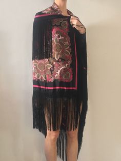 Gorgeous 1970s silk fringe maxi scarf. Perfect boho style worn with whatever you like! Shake your fringe! Add a pop of color pairing it with a black jacket. Wonderful soft silk with a dramatic black and hot pink floral paisley pattern. Hot pink, green, grey, white and black - super ornate and baroque paisley. Black rayon fringe border. Signature on the scarf is illegible. 100% silk. Please dry clean only. Very good vintage condition with no fabric or sewing flaws. Measurements 116cm by 116cm/ 45 Black Bohemian Shawl For Fall, Black Bohemian Shawl For Spring, Summer Bohemian Black Shawl, Vintage Fall Shawl, Bohemian Black Shawl For Summer, Black Bohemian Scarf For Summer, Black Bohemian Summer Scarf, Multicolor Fringe Shawl For Spring, Spring Multicolor Fringe Shawl