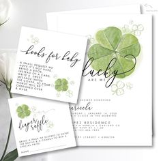 the wedding stationery features four leaf clovers