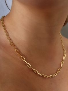 Rectangle Chain Link Necklace | Link Chain Choker | 18k Gold Filled Necklace | Medium Thick Link Chain Timeless, light & comfortable gold jewelry to wear all day, every day. Stunning piece to wear with layers, charms, or even by itself! Premium quality 18k Gold Filled Materials: Gold on Brass Measurements: Width 5mm - 16 inches long - 18 inches long Nickel & Lead Free Hypoallergenic Gold Rectangular Cable Chain Necklace, Gold Cable Chain Necklace, Gold Rectangular Chain Necklace, Rectangular Gold Chain Necklace, Gold Link Chain, Chain Choker, Chain Link Necklace, Chain Link, Gold Filled