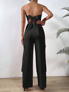 Exude effortless sophistication with our Solid Tube Top And Flap Pocket Side Cargo Pants. These pants are the perfect blend of style and functionality, featuring a solid colorway and flap pockets for extra storage. Whether you’re going for an edgy or classic look, these pants will cover you in all the right ways while the top will simply add to its elegance. Available in elegant black, striking orange, and a muted grey. Specifications: Pattern Type: Plain Details: Asymmetrical, Button, Pocket, T Solid Summer Pants With Multiple Pockets, Summer Pants With Multiple Pockets In Solid Color, Chic Solid Color Summer Cargo Pants, Cargo Pants With Pockets For Day Out, Wide Leg Trousers With Pockets For Day Out, Ankle-length Cargo Pants With Pockets For Day Out, Wide Leg Cargo Pants With Pockets For Day Out, Versatile Wide Leg Pants With Pockets For Day Out, Versatile Summer Cargo Pants With Pockets