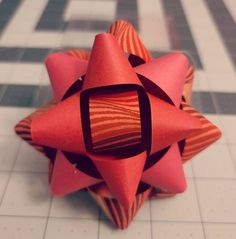 an origami star is on the floor