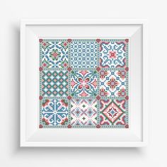 a cross stitch pattern in blue and red