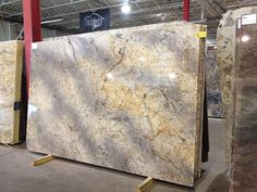 marble slabs are displayed in a warehouse