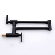 two black metal handles on a white background