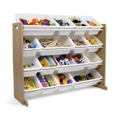 a wooden shelf with bins filled with toys