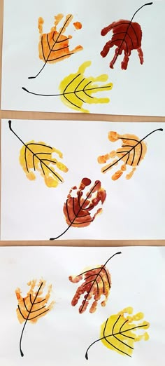 three handprints with leaves painted on them, one is orange and the other is yellow