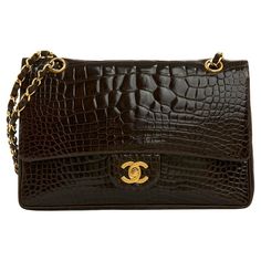 Check out this item from 1stdibs! 1990 Chanel Sac Classique 25 Precious brown leather double flap Bag Pristine: https://www.1stdibs.com/id-v_23356552 1990 Chanel, Chanel Cross Body Bag, Chanel 2014, Christian Dior Bag, Vintage Chanel Bag, Charles Jourdan, Chanel Collection, Classic Flap Bag, Bottega Veneta Shoulder Bag