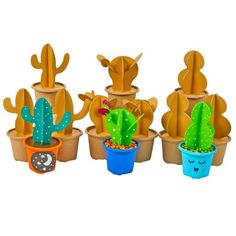 three potted cacti are shown in the shape of cactuses and other plants