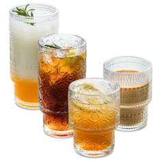 three glasses filled with different types of drinks