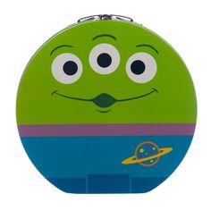 a green and blue lunch box with eyes on it