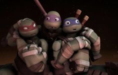 the teenage mutant turtles are holding baseball bats