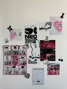 a white wall covered in posters and magnets with pictures on it's side