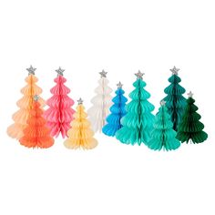 four different colored paper christmas trees