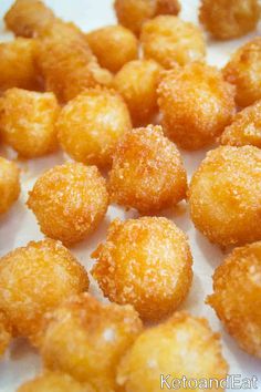 some fried food is sitting on a white plate