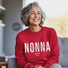 Get ready to be OBSESSED with your new PERSONALIZED NONNA Sweatshirt! This super soft crewneck is the cutest and most trendy way to emit all those nonna vibes! This is the perfect sweatshirt to throw on to show the whole world how much you love your grandkids. Also makes a great gift! This design is an original, created by Jackie Bonsignore @ Drift East Designs. She uses digital design elements and collage. She optimizes each image or illustration for a crisp, clear and gorgeous print onto a variety of apparel.  * Q U I C K * F A C T S * ✺ This is a Gildan 1800 crewneck, known for its warmth and softness. It's the perfect piece for cool weather and layered outfits! ✺ 50/50 cotton/polyester ✺ Wash and dry normally (on cool for best results) * S I Z I N G * ✺ Sizing is unisex so runs like me Italian Sayings, Nonna Gifts, Layered Outfits, Gift From Grandkids, Italian Quotes, Layering Outfits, Boyfriend Fit, Design Elements, Sweat Shirt