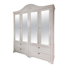 a white armoire with mirrored doors and drawers on the bottom, in front of a white background