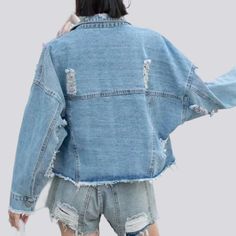 Welcome to the future of couture with the 2023 Spring-Summer Collection's Y2K style Embellished Women's Denim Jacket! This oversized jacket is a timeless blend of contemporary chic and vintage allure. boasting a sultry strapless design. edgy raw hem. exquisite zipper closure. and luxe denim fabric that will keep you looking and feeling your best all season long.Distinctive Features: Y2K Style: Inspired by the 2000s. this oversized jacket will have you turning heads and showing off your unique st Summer Ripped Cotton Denim Jacket, Ripped Cotton Denim Jacket For Summer, Chic Summer Denim Jacket With Frayed Hem, Trendy Summer Outerwear With Frayed Hem, Summer Light Wash Outerwear With Frayed Hem, Chic Spring Denim Jacket With Frayed Hem, Summer Distressed Long Sleeve Denim Jacket, Oversized Summer Outerwear With Frayed Hem, Oversized Denim Blue Summer Outerwear