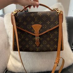 Authentic *Vintage* Beautiful, Loved And Pre-Owned Rare Louis Vuitton Bel Air Handbag With Crossbody, Shoulder, And Hand Held Options. Monogram Pattern, Top Handle, Fold Over Top With An Inside Open Pocket. Fastens With A Buckle, And The Strap Is Detachable. 11” Wide At Bottom, 9” High, And 4.5” Deep. Very Large Area For Belongings! Rare Louis Vuitton, Louis Vuitton Vintage, Monogram Pattern, Vintage Louis Vuitton, Bel Air, Fold Over, Louis Vuitton Bag, Louis Vuitton Monogram, Top Handle