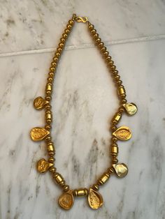 Vintage Kenneth Lane Chinky gold statement necklace In excellent condition Measures 22" Handmade Gold Beaded Costume Necklace, Gold Temple Necklace With Gold Beads, Gold Long Temple Necklace With Beads, Long Gold Brass Beaded Necklace, Long Gold Beaded Brass Necklace, Gold Beaded Brass Necklaces, Vintage Handmade Gold Temple Necklace, Vintage Gold Brass Temple Necklace, Copper Solder