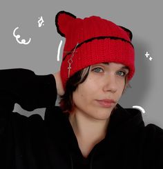 Warm handmade crochet cat ear beanie, cat ear winter hat in red and black colors. Made out of acrylic yarn. Soft and stylish with some added accessories.  Perfect for autumn and winter days. Check out my shop for more - https://nyoops.etsy.com Tags: handmade hat, crochet beanie, crochet hat, cute beanie, cool beanie, alternative style, red beanie Trendy Handmade Winter Crochet Hat, Trendy Black Handmade Crochet Hat, Cute Black Crochet Hat For Winter, Casual Crochet Hat With Cat Ears For Winter, Warm Crochet Hat With Cat Ears For Winter, Winter Casual Crochet Hat With Cat Ears, Beanie With Cat Ears, Warm Crochet Cat Ears Hat For Winter, Warm Winter Crochet Hat With Cat Ears