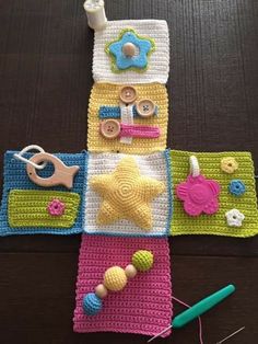 crocheted placemats are arranged on a table with scissors and other items