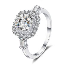 Elevate your love story with our exquisite 10K White Gold Engagement Ring, featuring a stunning princesssquare cut moissanite that radiates brilliance and elegance for the modern woman. Crafted from highquality 10K white gold, this engagement ring showcases a clear, squareshaped moissanite at its center, capturing and reflecting light from every angle. Perfectly designed for women, its timeless princesscut adds a touch of sophistication and sparkle, making it an ideal symbol of enduring affectio Silver Diamond Rings, Dimond Ring, Ghost Mannequin, Stone Properties, Asscher Diamond, Cushion Cut Moissanite, Jewelry Ads, Picture Style, Moissanite Jewelry