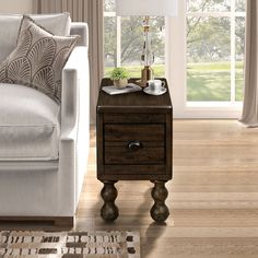 a living room scene with focus on the end table and couch in the foreground