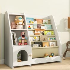 a child's book shelf with books and toys in it