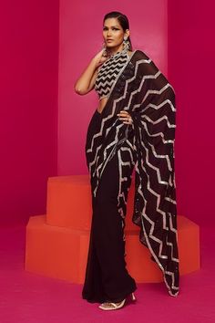 Black pre-draped saree with sequin, cutdana, bead embroidery in chevron pattern. Paired with halter neck embroidered blouse. - Aza Fashions Sarees Black, Draped Saree, Sequin Halter, Drape Saree, Saree With Blouse, Bead Embroidery, Chevron Pattern, Embroidered Blouse, Aza Fashion