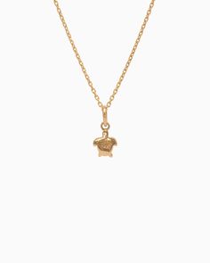 The Turtle Charm is handcrafted in 14K solid gold and features a detailed design inspired by sea turtles, celebrated as iconic symbols of the Caribbean. Playful yet sophisticated, this charm complements any look. Pair with your favorite hook bracelet or dainty chain, sold separately. Metal: 14K solid gold Dimensions: 9.5mm x 6mm x 2mm Style #: GC203S Elegant Pendant Charms With Logo, Elegant Pendant Logo Charm, Elegant Logo Charm Pendant, Gold-plated Jewelry With Logo Charm, Luxury 14k Yellow Gold Charms, Elegant Yellow Gold Jewelry With Logo Charm, Classic Gold Plated Jewelry With Logo Charm, Classic Gold-plated Jewelry With Logo Charm, Luxury Yellow Gold Sterling Silver Charms