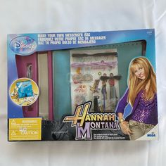 the box is open to reveal an assortment of items for barbie's doll house