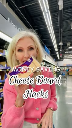 a blonde woman holding up a piece of cheese board in her mouth with the words money saving cheese board hacks on it