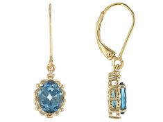 2.72ctw Oval London Blue Topaz and 0.01ctw Round White Diamond 18K Yellow Gold Over Sterling Silver Dangle Earrings. Measures Approximately 1.16"L X 0.32"W. Lever-Back Backings Silver Dangle Earrings, Sterling Silver Dangle Earrings, Broken Chain, London Blue Topaz, Topaz Gemstone, London Blue, Earrings Collection, Silver Earrings Dangle, White Diamond