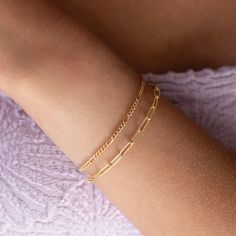 Our Piper Bracelet showcases a dotted detail paper clip chain making this an absolute classic! If you are local to Eau Claire stop by our storefront and add some charms for a personalized flare! DETAILSAvailable in 14k gold fill or sterling silver. Bracelet Sizing: XS= 5.5", S=6", M=6.5", L=7", XL=7.5".5" adjustable spring hook claspHypoallergenic and waterproof To measure your wrist size, wrap a piece of string around your wrist the way you would like the bracelet to fit. Then lay the string fl Classic Everyday Charm Bracelet With Adjustable Chain, Classic Everyday Paperclip Bracelet With Delicate Chain, Everyday Link Charm Bracelet With Delicate Chain, Everyday Paperclip Chain Charm Bracelet, Classic Everyday Charm Bracelet With Delicate Chain, Adjustable Classic Charm Bracelet For Everyday, Adjustable Box Chain Charm Bracelet For Everyday, Adjustable Classic Charm Bracelet, Everyday Charm Bracelet With Box Chain