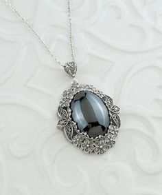 Silver Large Hematite Pendant Necklace, Handmade Floral Filigree Oval Statement Pendant with Big Metallic Gray Stone, 925 Sterling Silver Silver gift for mom, bouquet pendant, Nature necklace, wedding gift her, bridesmaid gift her, daisy pendant Gemstone: Hematite 18x25mm  ( NICKEL FREE ) Chain Length:  -21 Inches ( 53 cm ) -18 Inches + 2 Inches Extender ( 46 cm + 5 cm Extender ) Pendant height and width: -1.65 Inch X 1.3 Inch // 4.2cm X 3.3cm  -The Silver Large Hematite Pendant Necklace is a st Silver Oval Victorian Necklace, Silver Victorian Oval Necklace, Victorian Silver Oval Necklace, Ornate Silver Necklace With Cabochon, Ornate Silver Cabochon Necklace, Silver Oval Cabochon Necklace For Formal Occasions, Silver Oval Filigree Necklace, Ornate Silver Oval Cabochon Jewelry, Silver Oval Cabochon Necklace For Anniversary