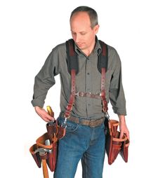 By distributing weight over the shoulders, these suspension systems allow a loaded tool belt to be carried with relative ease. The Stronghold system has a comfortable contoured yoke with a padded moisture-wicking absorbent liner and length-adjustable leather cross straps. A set of four leather straps with D-ring loop attachments is included for quick connection to any tool belt up to 3" wide. The adjustable chest strap has a metal clip for quick-release. A heavy-duty D-ring on the yoke allows ha Occidental Leather, Leather Tool Belt, Tool Belts, Leather Suspenders, Tool Pouch, Chest Strap, New Catalogue, Tool Belt, Leather Projects