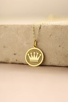 Gold Crown Pendant - Crown Gold Necklace ● Material of pendant: Solid Gold 14k ( REAL GOLD ) ● Metal Stamp: 14k ( REAL GOLD ) ● The pendant is available in 5 sizes: - 12,7 mm / 0.5 inches (Diameter) - 14,0 mm / 0,55 inches ( Diameter ) In the photos - 15,3 mm / 0.6 inches ( Diameter ) - 16,5 mm / 0,65 inches ( Diameter ) - 19,1 mm / 0,75 inches ( Diameter ) ( In the photos the size is 14mm / 0.55 inches Diameter ) ( Jump Ring inner diameter: 4 mm ) ● Material of chain: Solid gold 14k ( REAL GOLD Custom White Gold Necklace With Round Pendant, Custom 14k White Gold Round Pendant Necklace, Formal White Gold 14k Charm Necklaces, Formal Yellow Gold Pendant Charm Necklaces, Formal Yellow Gold Pendant Charm Necklace, Symbolic Round Necklace For Formal Occasions, Formal Tarnish-resistant Round Pendant Charm Necklace, Formal Medallion Necklace With Charms, Formal Medallion Charm Necklaces