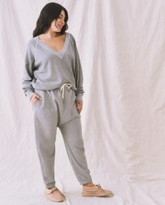 The V-Neck Sweatshirt. -- Varsity Grey – The Great. Emily And Meritt, College Sweatshirt, Leg Cuffs, Product Label, Deep V Neck, Raglan Sleeve, Two Pieces, Military Jacket, Binding