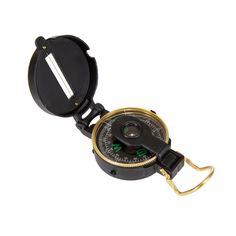 a black and gold compass on a white background with clippings to the side