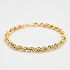 Make a statement with our Rope Chain Bracelet! Featuring a unique rope chain design and a 100mm hollow chain, this 7.25 inch bracelet is made in sterling silver and gold plated for a luxurious touch. Perfect for stacking, this bracelet is a must-have for any jewelry collection. Chain Design, Beautiful Gift Boxes, Rope Chain, Silver And Gold, Chain Bracelet, Jewelry Collection, 18k Gold, Gold Plate, Plating