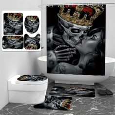 a bathroom with a shower curtain, toilet and rugs in the shape of skulls