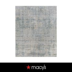 an image of a gray and white rug with stars on the bottom, which reads macy's